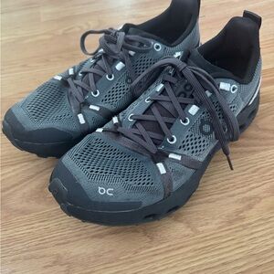On Running Women’s Gray and Black Cloudsurfer Trail Shoes
